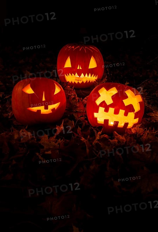 Glowing pumpkins at night