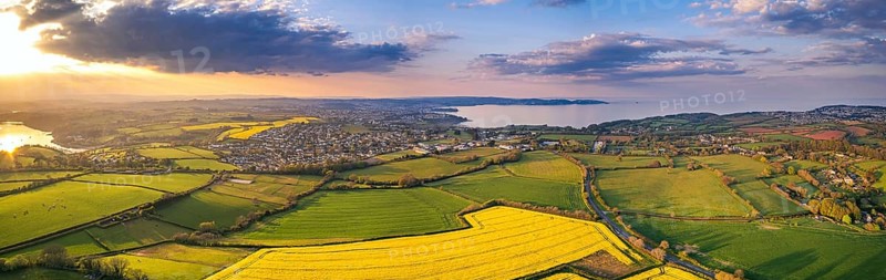 Sunset over Devon Fields and Farmlands from a drone