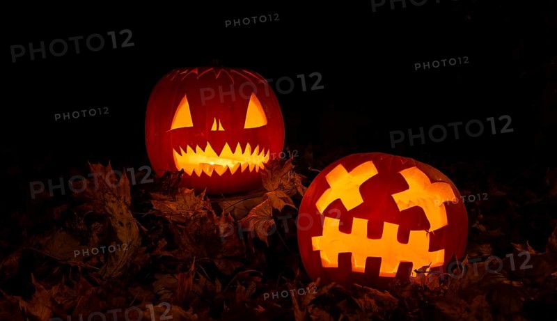 Glowing pumpkins at night