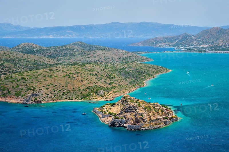 Island of Spinalonga with old fortress former leper colony and the bay of Elounda
