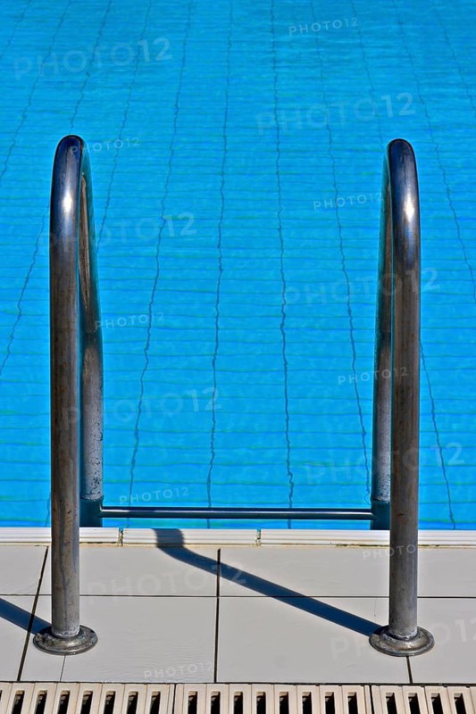 Metal ladder to swimming pool
