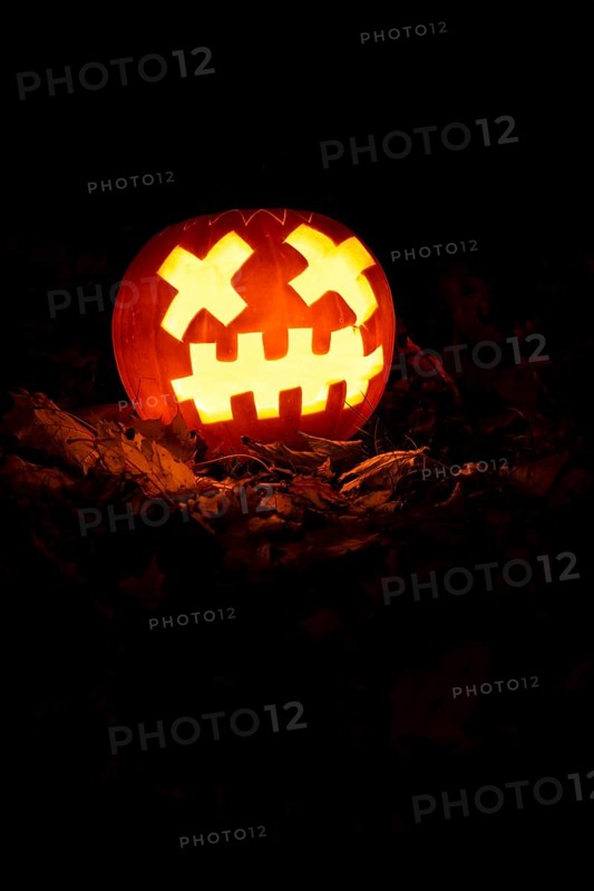 Glowing pumpkins at night