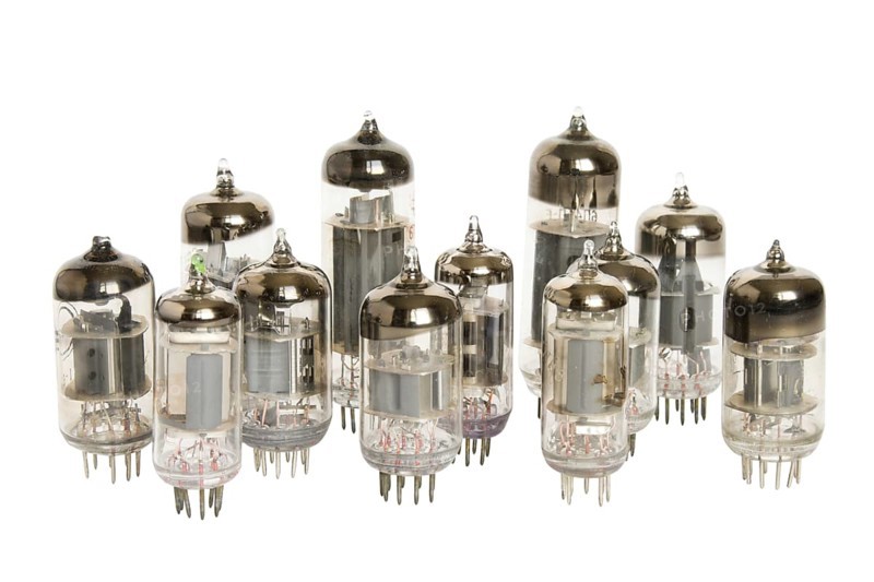 Old vacuum tubes on white background