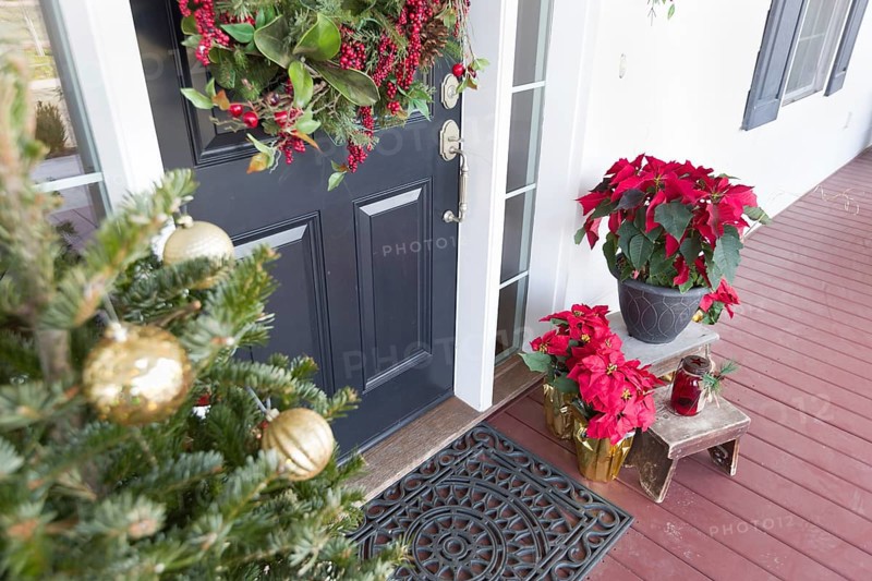 Christmas decorations at front door of house