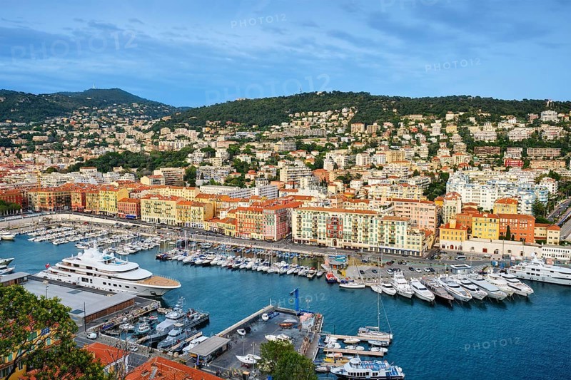 View of Old Port of Nice with luxury yacht boats from Castle Hill