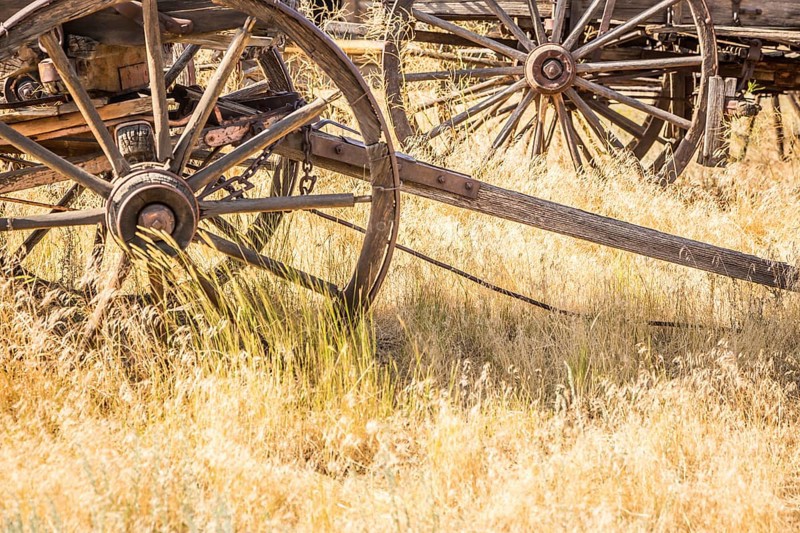 Abstract of vintage antique wood wagons and wheels