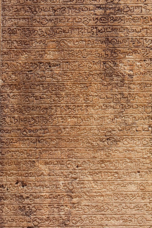 Ancient stone inscriptions in Singalese language texture Pollonaruwa
