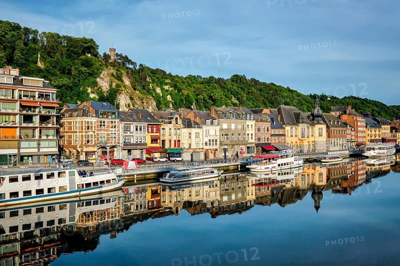 View of picturesque Dinant city over the Meuse river Dinant is a Walloon city and municipality located on the River Meuse
