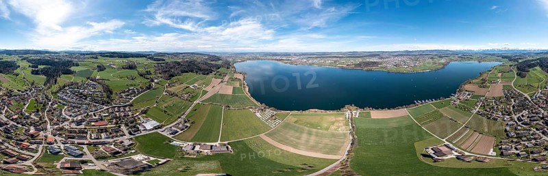 Large 360 degree panorama of Lake Greifen with the towns of Maur and Uster