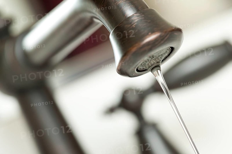 Close-up of water dripping from water faucet