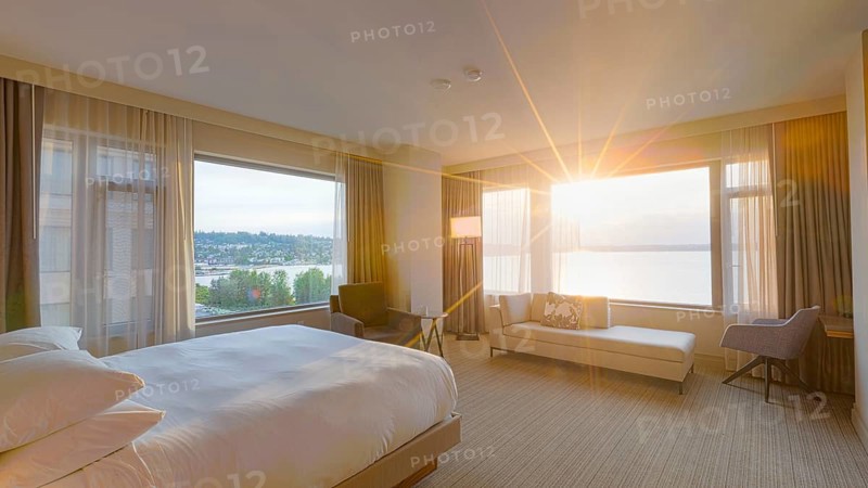 Modern bedroom interior with lakeview window