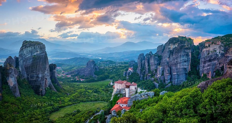 Sunset sky and monastery of Rousanou and Monastery of St