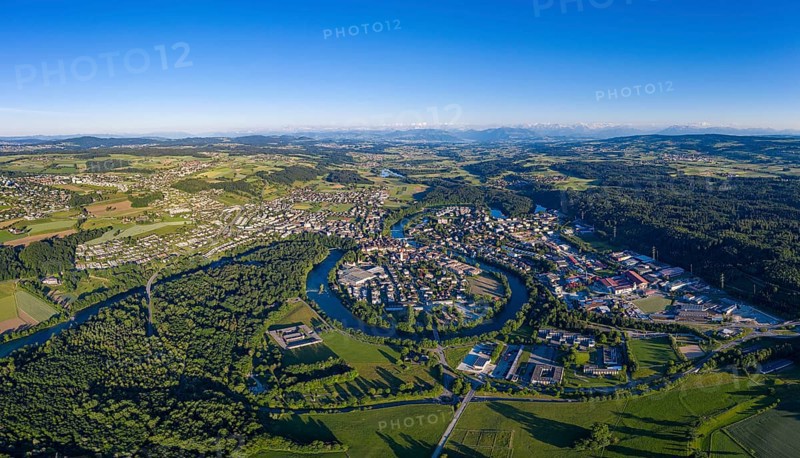 Aerial view of the town of Bremgarten and the meandering Reuss river in the Reuss valley of the canton of Aargau