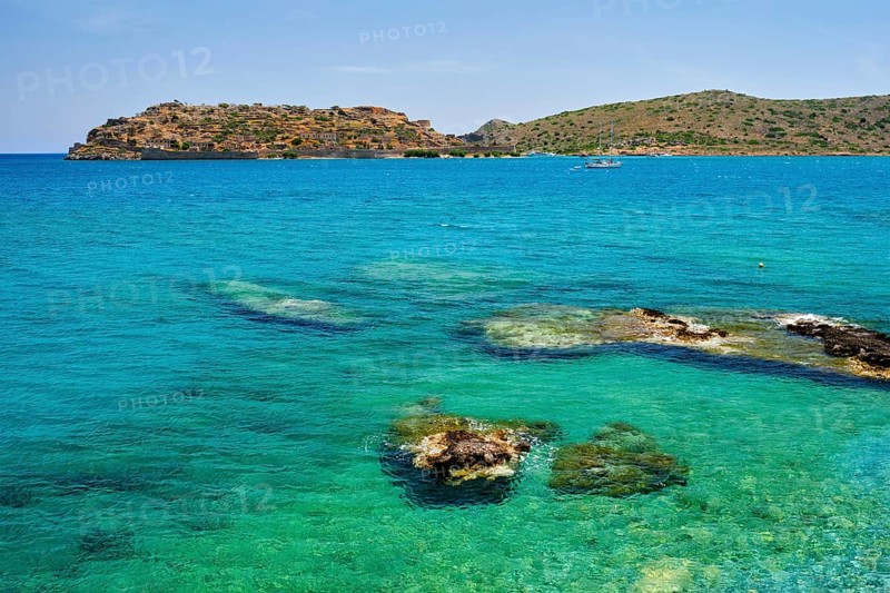 Island of Spinalonga with old fortress former leper colony and the bay of Elounda