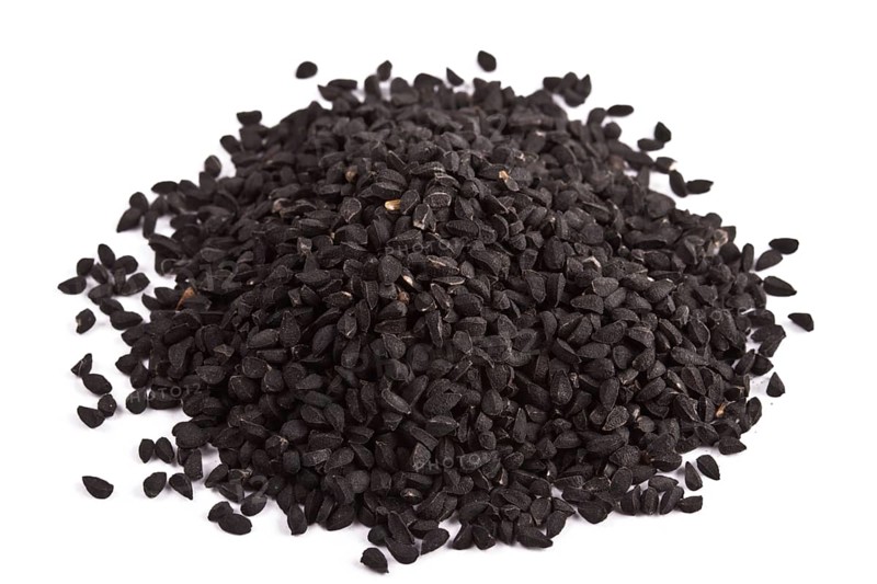 Pile of kalinji spice isolated on white background