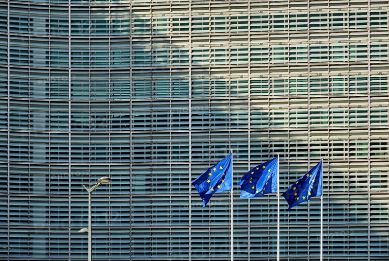 European EU flags in front of the Berlaymont building