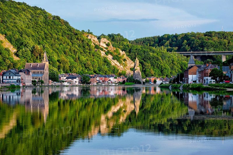 View of picturesque Dinant city over the Meuse river Dinant is a Walloon city and municipality located on the River Meuse