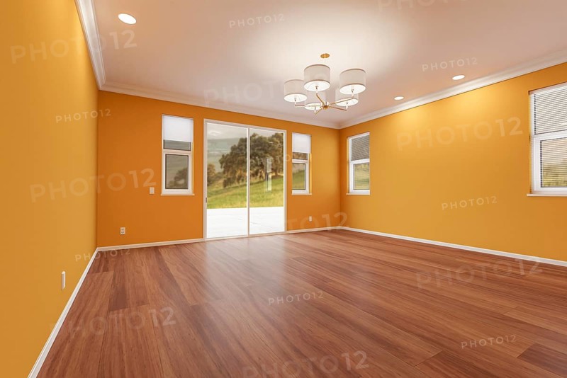 Newly remodeled room of house with finished wood floors