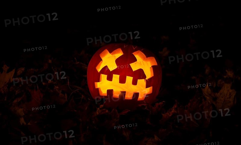 Glowing pumpkins at night