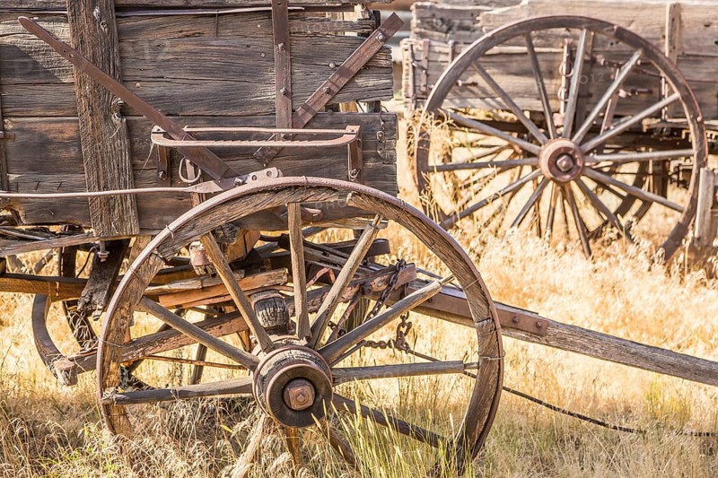 Abstract of vintage antique wood wagons and wheels