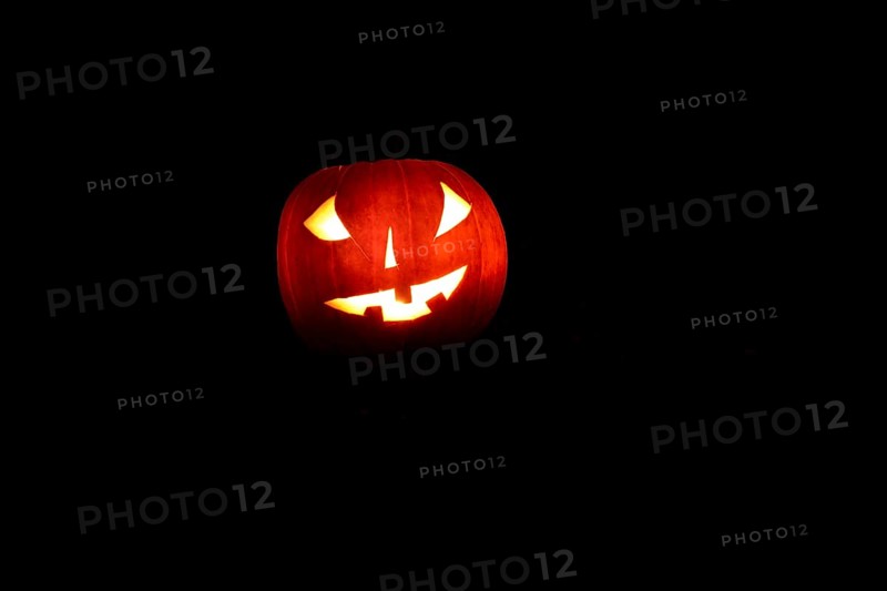 Glowing pumpkins at night