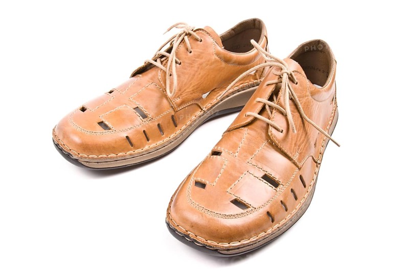 Two man's summer shoes isolated on white background