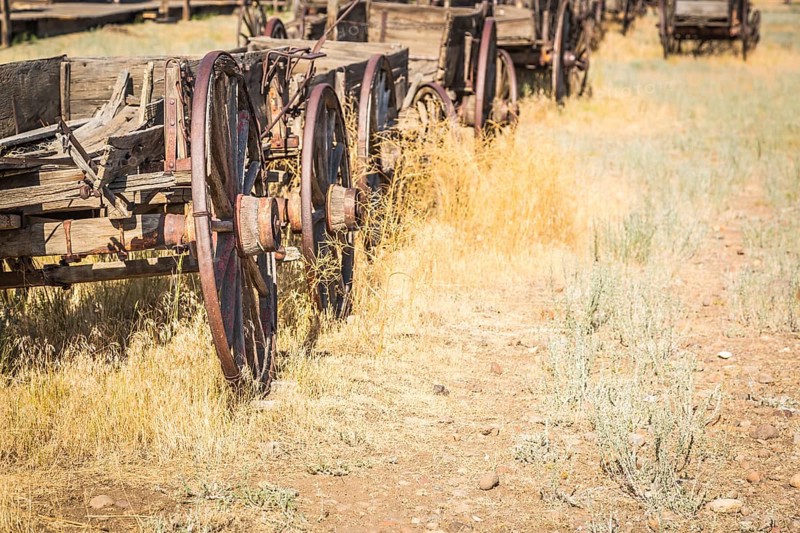 Abstract of vintage antique wood wagons and wheels