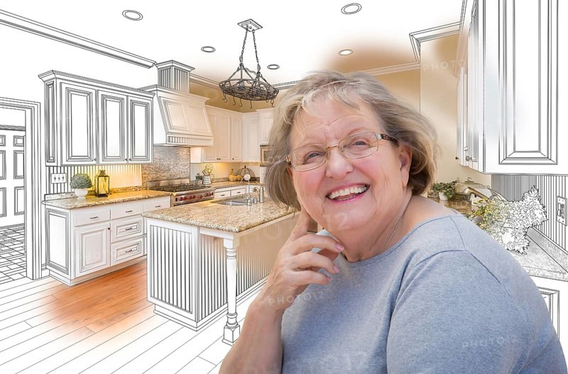 Happy senior woman over custom kitchen design drawing and photo