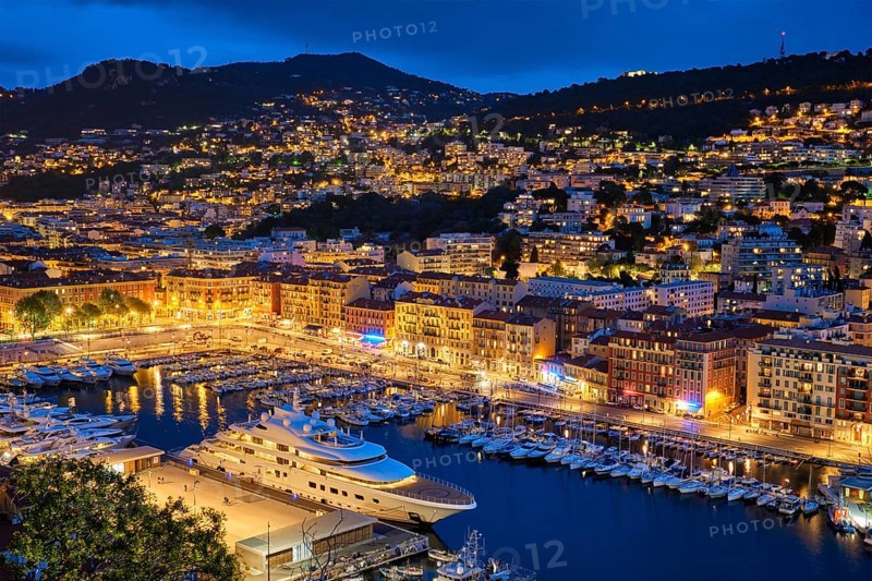View of Old Port of Nice with luxury yacht boats from Castle Hill