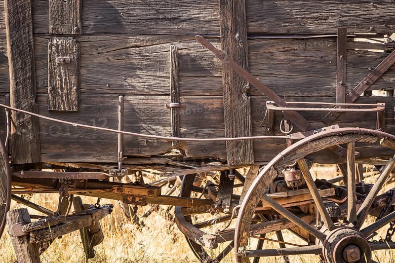 Abstract of vintage antique wood wagons and wheels