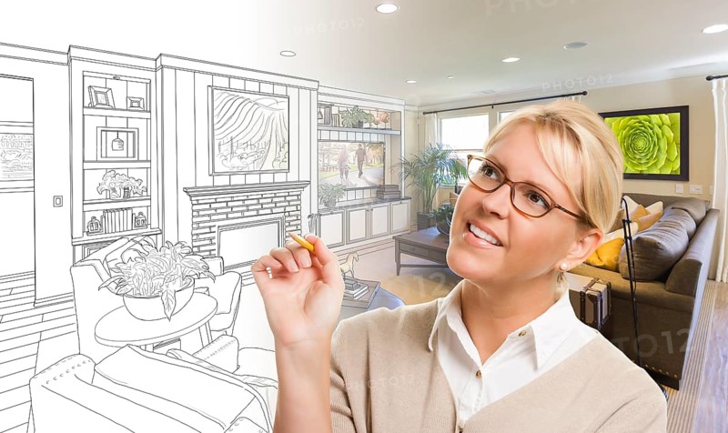 Woman with pencil over living room design drawing and photo combination