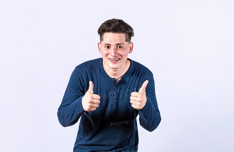 Positive guy with thumbs up doing ok