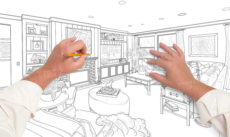 Male hands drawing custom living room design on white