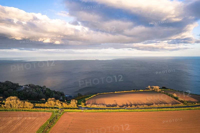 Devon Fields and Farmlands at sunset time from a drone over Labrador Bay