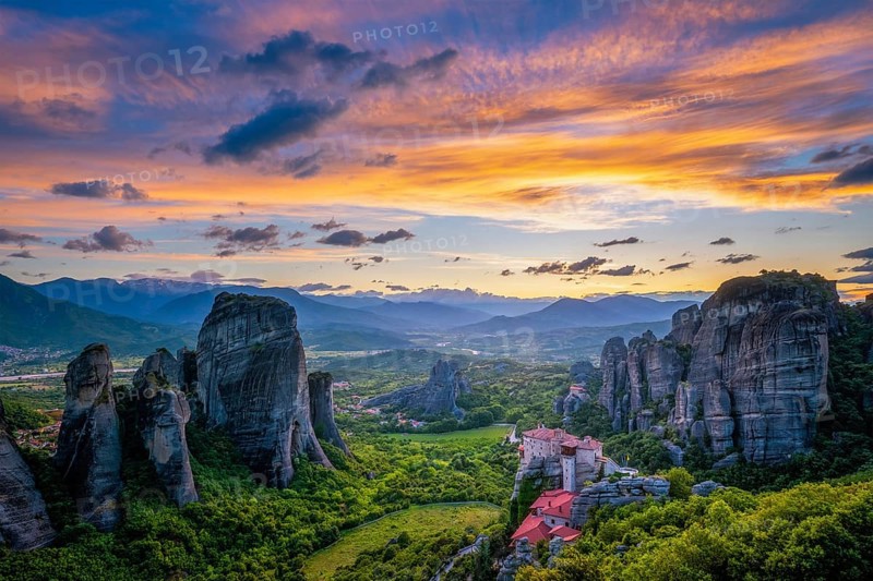 Monastery of Rousanou and Monastery of St. Nicholas Anapavsa in famous greek tourist destination Meteora in Greece on sunset
