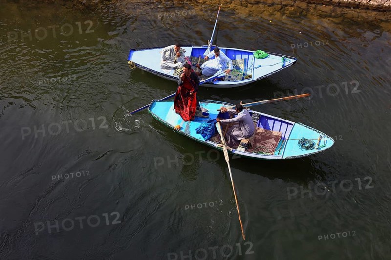 Souvenir seller with a rowing boat on the Nile