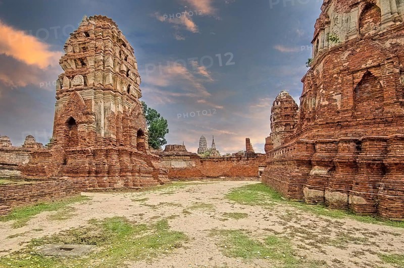 Weathered pagodas in the early morning at Wat Mahathat temple