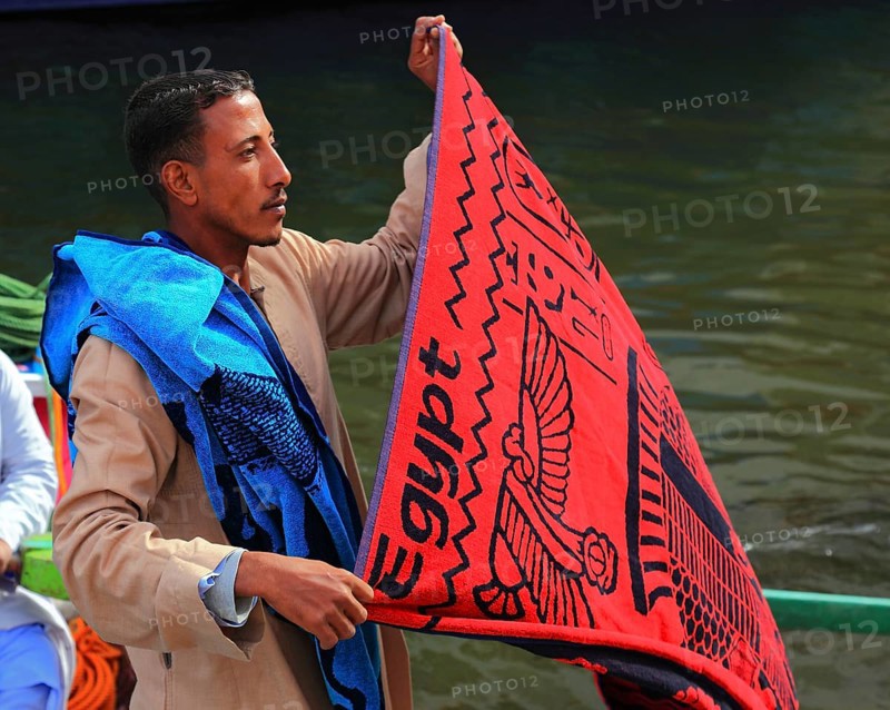 Souvenir seller with a rowing boat on the Nile