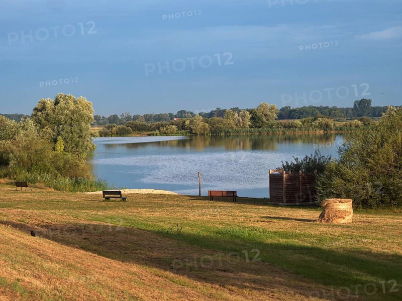 Meadow and bathing beach at Gartow Lake in the Elbe River Landscape UNESCO Biosphere Reserve. Gartow