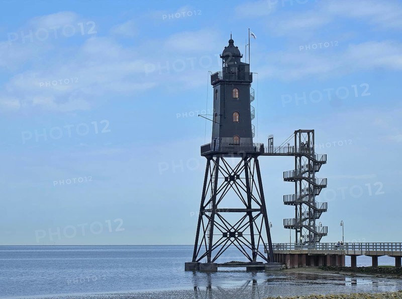 Lighthouse monument Obereversand in the area of the Weser estuary into the North Sea. The height is 37. 4 m above low water. It is a black
