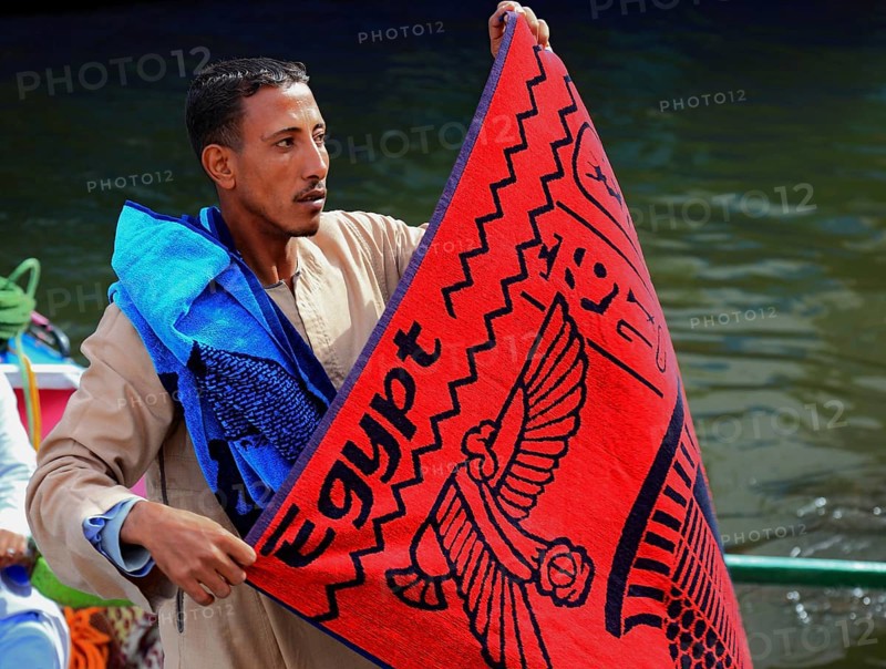 Souvenir seller with a rowing boat on the Nile