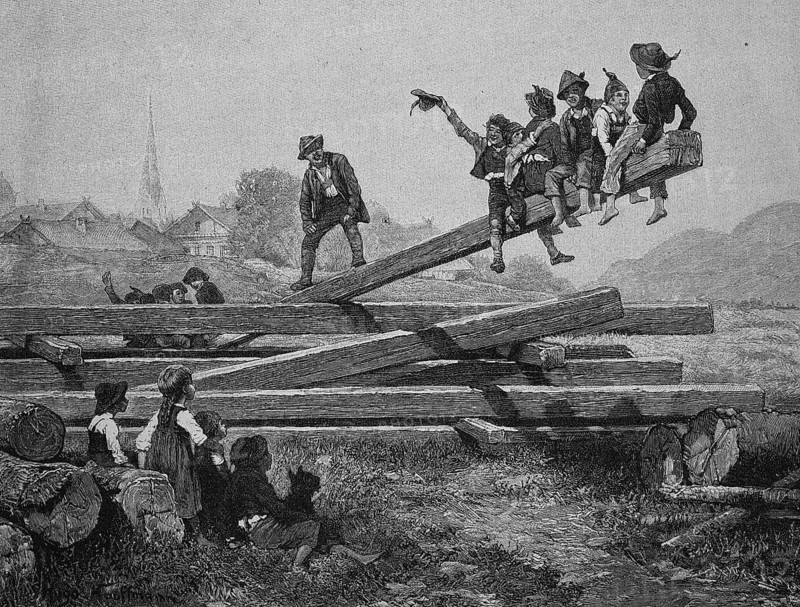 Kinder spielen auf Holzbalken Wippe