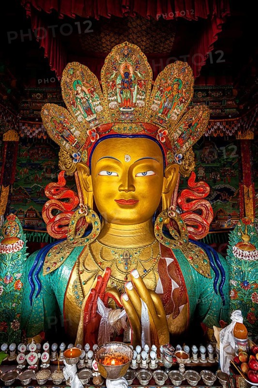 Maitreya Buddha statue face close up in Thiksey Gompa. Ladakh