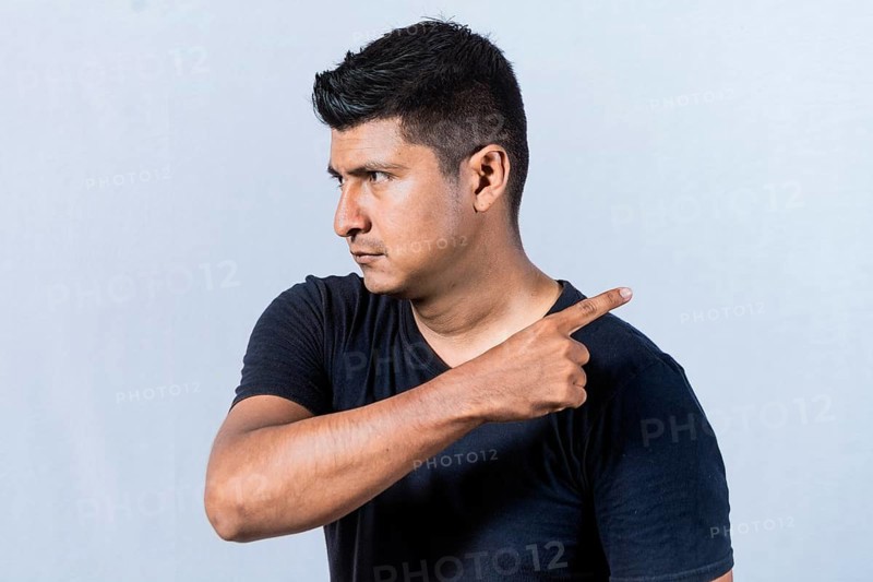 Angry person pointing to get out