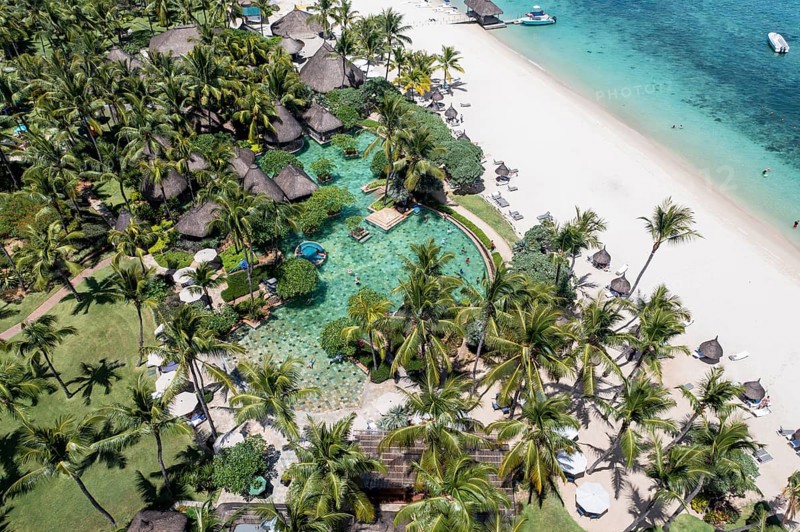 Aerial view The beach of Flic en Flac with luxury hotel and palm trees