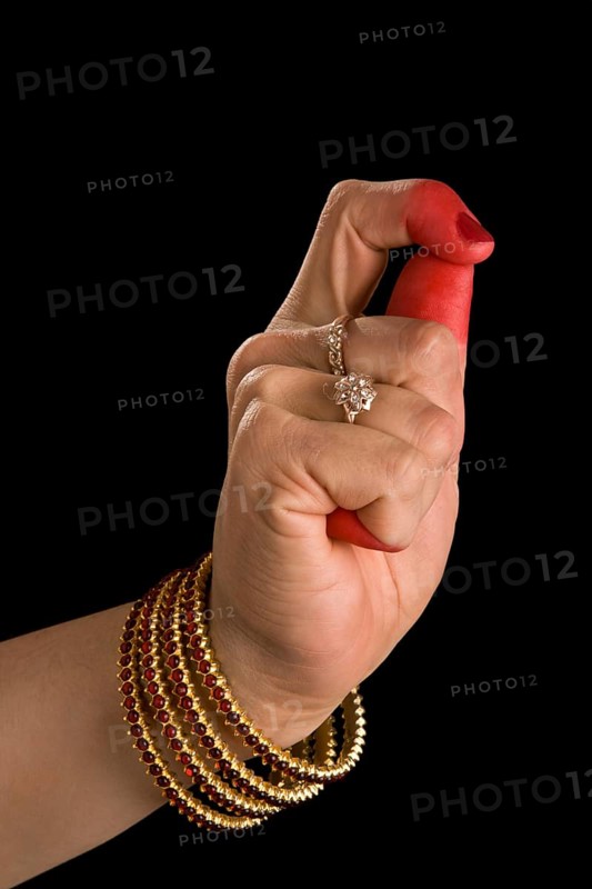 Woman hand showing Kapittha hasta