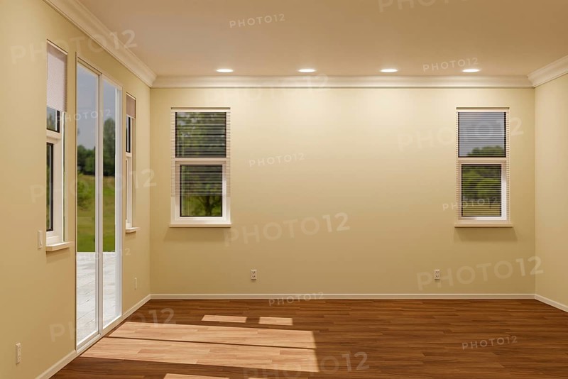 Newly remodeled room of house with finished wood floors