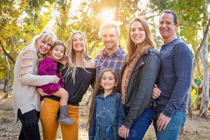 Multigenerational mixed-race family portrait outdoors
