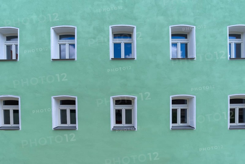 Turquoise facade with windows