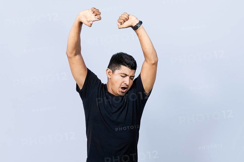 People yawning and stretching his hands
